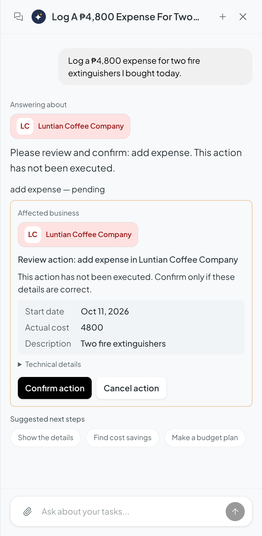 An AI agent in Tamoogi preparing a ₱4,800 expense for two fire extinguishers from a plain-language request. It shows the business, date, amount and description, and waits on Confirm action or Cancel action. Nothing is recorded yet.